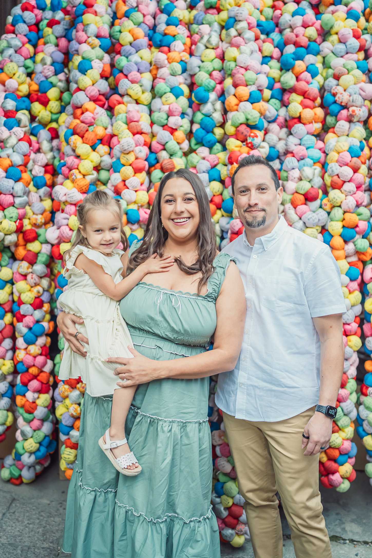 Sam with his wife and daughter